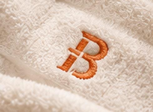 Turuncu monogram nakışlı havlu